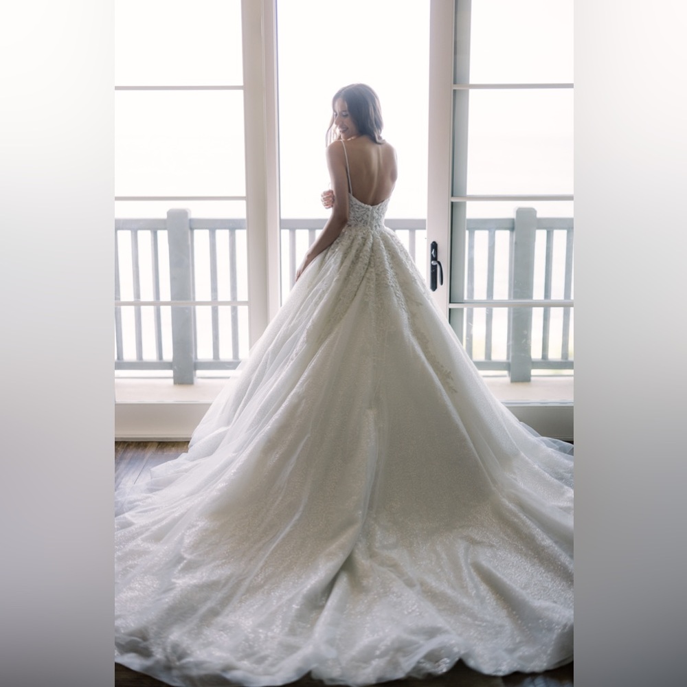 Wedding dress by couture Myana Bridal.